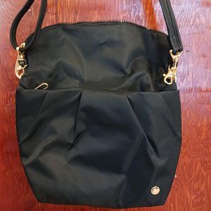 Pacsafe anti-theft convertible crossbody